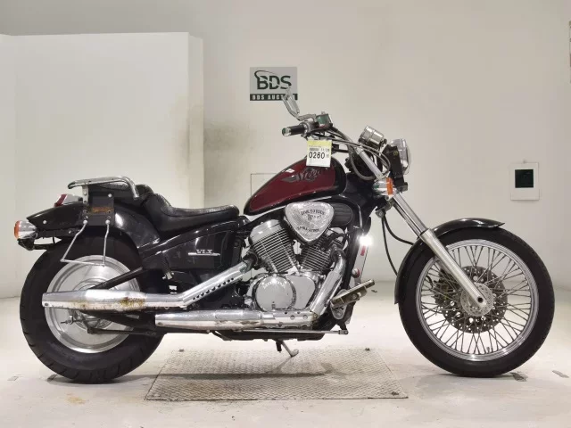 Honda STEED600 лот № 0260 оценка 4  с аукциона в Японии