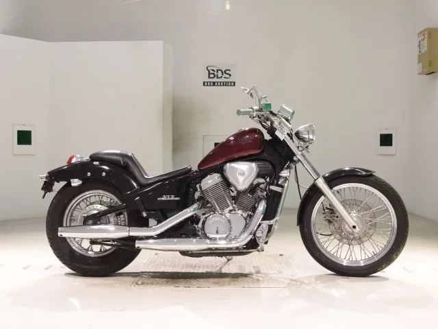 Honda STEED600 лот № 0530 оценка 4  с аукциона в Японии