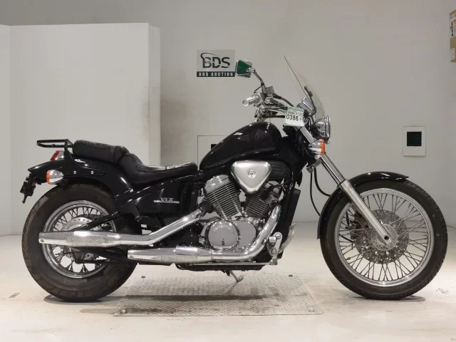 Honda STEED600 лот № 0386 оценка 4  с аукциона в Японии