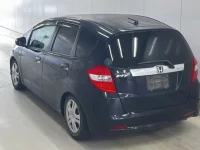 Honda FIT лот № 2059 оценка 3.5  с аукциона в Японии 1