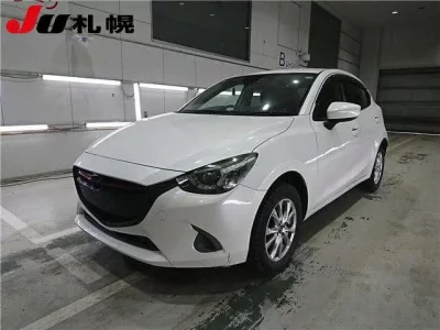 Mazda DEMIO  с аукциона в Японии