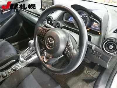Mazda DEMIO  с аукциона в Японии
