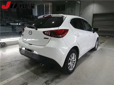 Mazda DEMIO  с аукциона в Японии