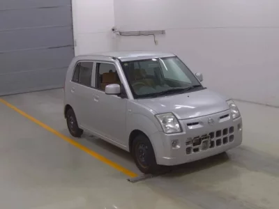Nissan PINO  с аукциона в Японии