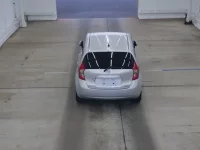 Nissan NOTE лот № 2099 оценка RA  с аукциона в Японии 2