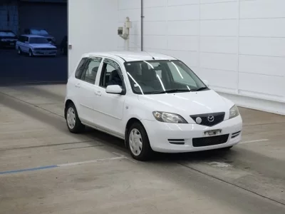 Mazda DEMIO  с аукциона в Японии