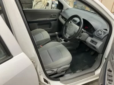 Mazda DEMIO  с аукциона в Японии