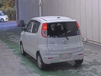 Nissan MOCO лот № 1051 оценка RA  с аукциона в Японии 1