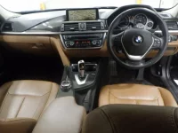 BMW 3-Series лот № 7039 оценка 3.5  с аукциона в Японии 2