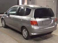 Honda FIT лот № 7764 оценка 3.5  с аукциона в Японии 1