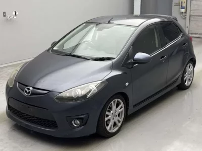 Mazda DEMIO  с аукциона в Японии