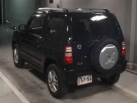 Nissan KIX лот № 1109 оценка 3  с аукциона в Японии 1