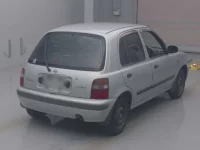 Nissan MARCH лот № 4 оценка RA  с аукциона в Японии 1