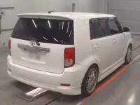 Toyota COROLLA RUMION лот № 10034 оценка RA  с аукциона в Японии 1