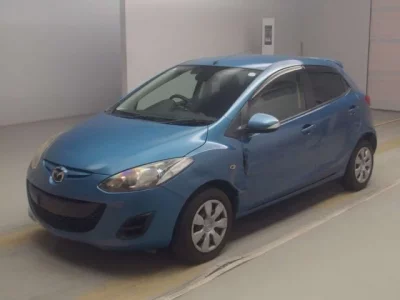 Mazda DEMIO  с аукциона в Японии