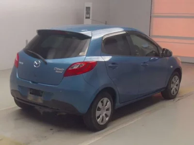 Mazda DEMIO  с аукциона в Японии