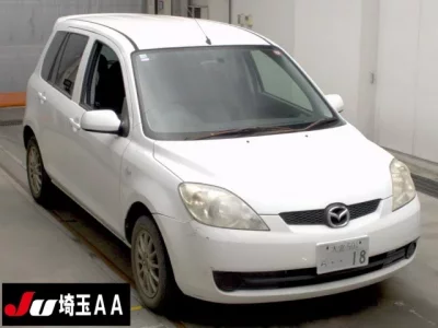 Mazda DEMIO  с аукциона в Японии