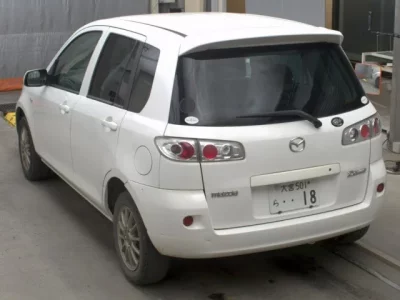 Mazda DEMIO  с аукциона в Японии