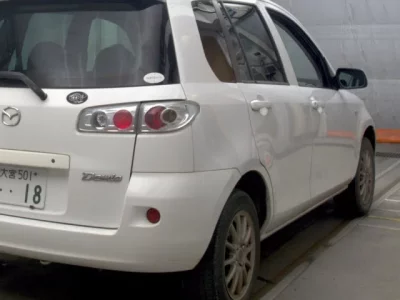 Mazda DEMIO  с аукциона в Японии