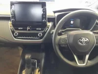 Toyota COROLLA SPORT лот № 4135 оценка R  с аукциона в Японии 8