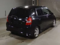 Honda FIT лот № 7056 оценка R  с аукциона в Японии 1