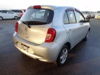 Nissan MARCH лот № 1203 оценка 3.5  с аукциона в Японии 1