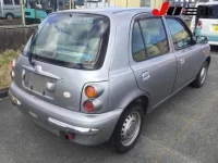 Nissan MARCH лот № 7319 оценка -  с аукциона в Японии 4