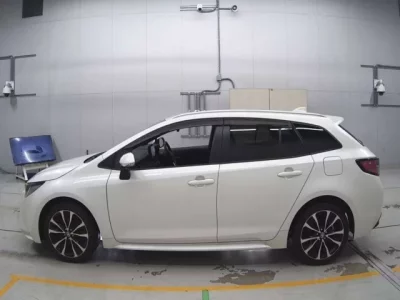 Toyota COROLLA TOURING  с аукциона в Японии
