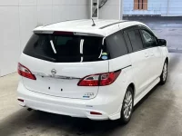 Nissan LAFESTA лот № 1067 оценка 4  с аукциона в Японии 1