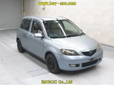 Mazda DEMIO  с аукциона в Японии