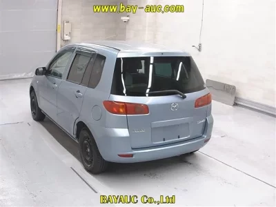Mazda DEMIO  с аукциона в Японии
