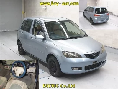 Mazda DEMIO  с аукциона в Японии