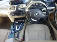 BMW 3-Series лот № 7048 оценка 3.5  с аукциона в Японии 2