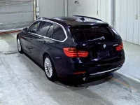 BMW 3-Series лот № 7048 оценка 3.5  с аукциона в Японии 1