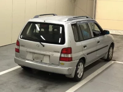 Mazda DEMIO  с аукциона в Японии