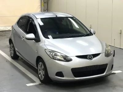 Mazda DEMIO  с аукциона в Японии