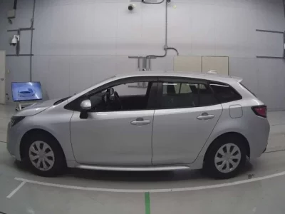 Toyota COROLLA TOURING  с аукциона в Японии