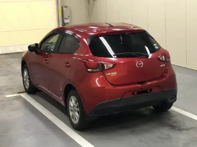 Mazda DEMIO  с аукциона в Японии