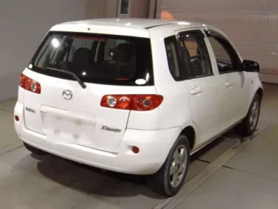 Mazda DEMIO  с аукциона в Японии