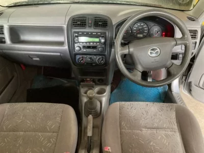 Mazda DEMIO  с аукциона в Японии