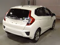 Honda FIT лот № 7062 оценка R  с аукциона в Японии 1