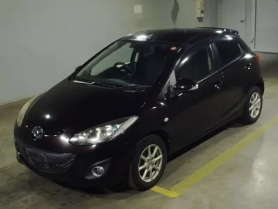 Mazda DEMIO  с аукциона в Японии