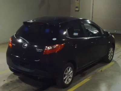 Mazda DEMIO  с аукциона в Японии