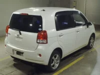Toyota PORTE лот № 7100 оценка RA  с аукциона в Японии 1