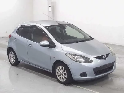 Mazda DEMIO  с аукциона в Японии