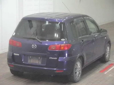Mazda DEMIO  с аукциона в Японии