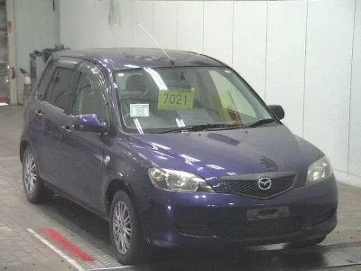 Mazda DEMIO  с аукциона в Японии