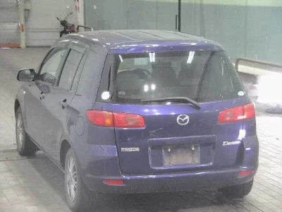Mazda DEMIO  с аукциона в Японии