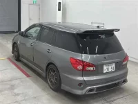 Nissan WINGROAD лот № 30074 оценка 4  с аукциона в Японии 1