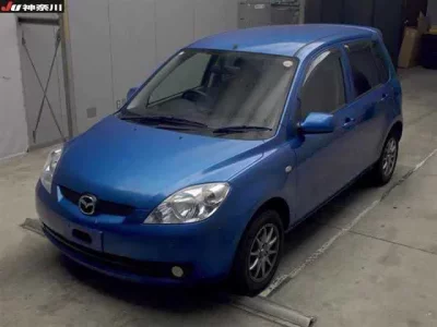 Mazda DEMIO  с аукциона в Японии